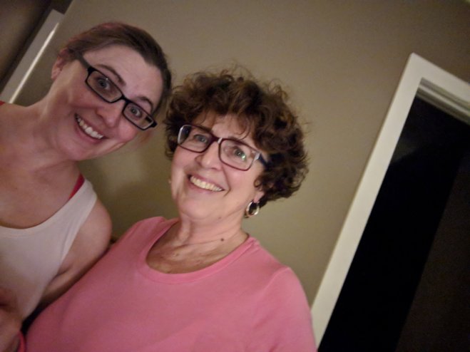 Mom and I, both wearing pink